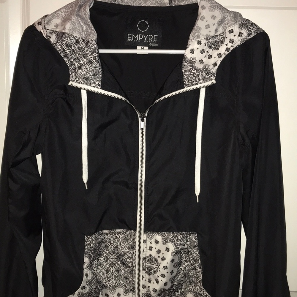 Black wind breaker with detailing